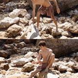 Model is 1.88 m (6'2") and wears size M