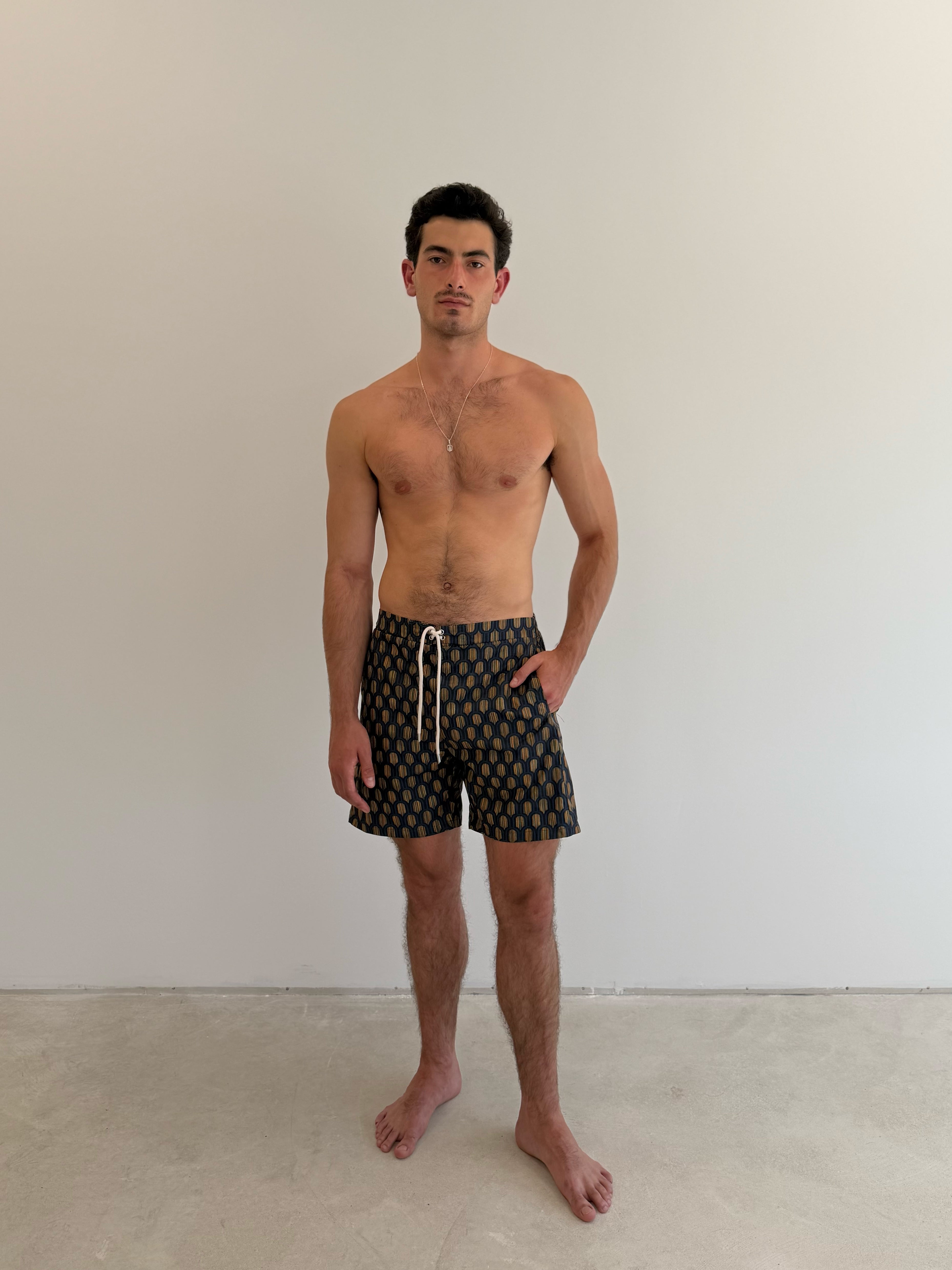 model- Model is 1.88 m (6'2") and wears size M