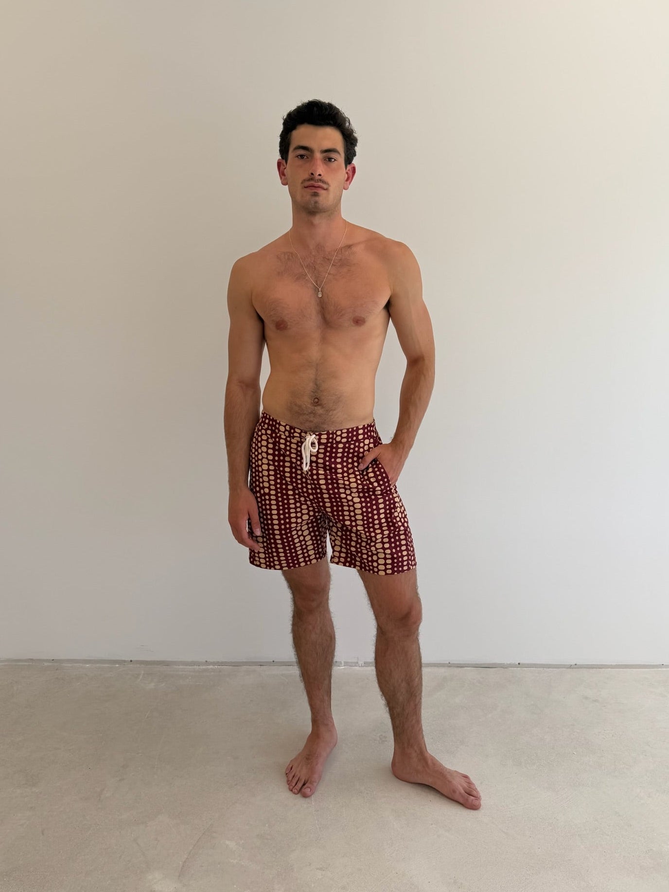 model- Model is 1.88 m (6'2") and wears size M