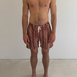 Model is 1.88 m (6'2") and wears size M
