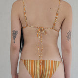 model- Model is 1.64 m (5'4") and wears size S
